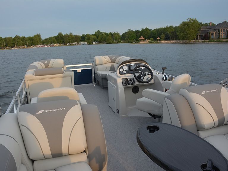 People riding on a Pontoon Boat