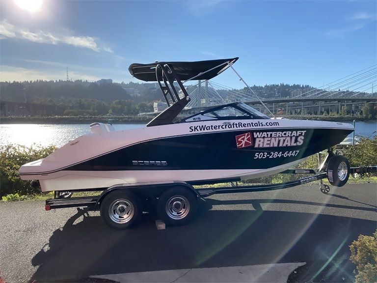 People riding on a Scarab Jetboat